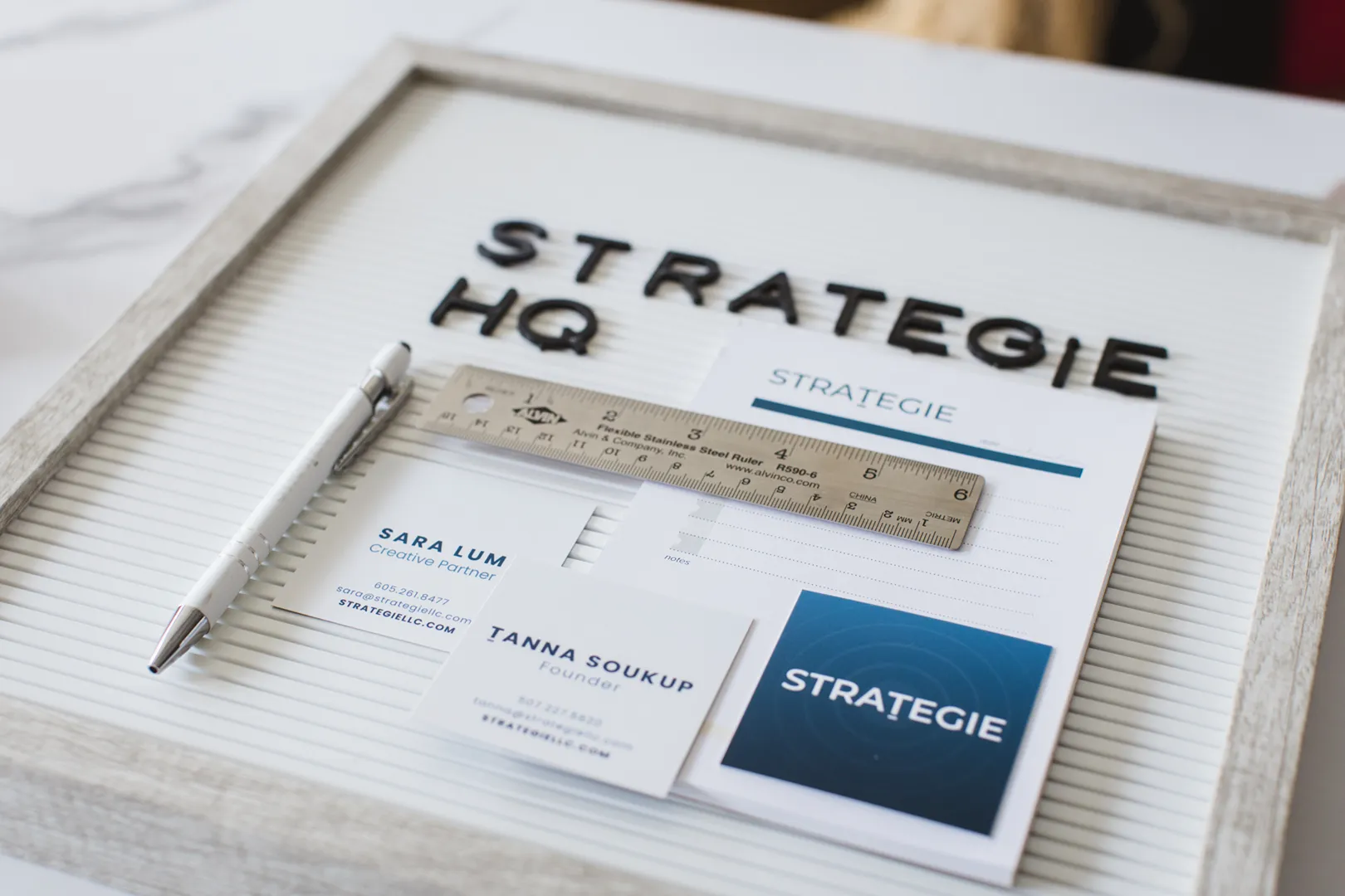 Flat lay image of a suite of brand assets.